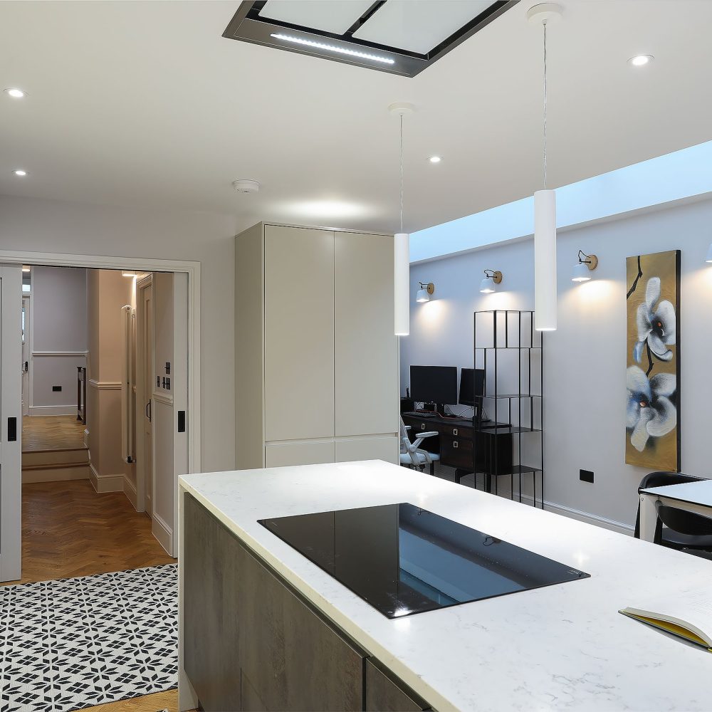 Wrap-around kitchen extension with Velux Unlimited roof skylight in Blackheath SE3, London