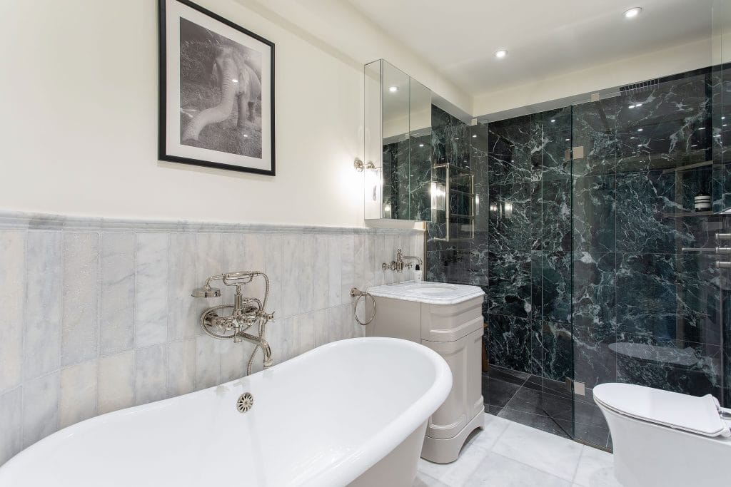 Master bathroom with marble tiles in London E1 renovation