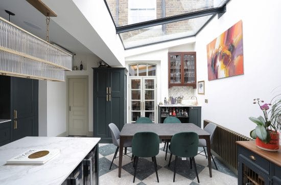 Butterfly roof kitchen extension with glazed section in London E1