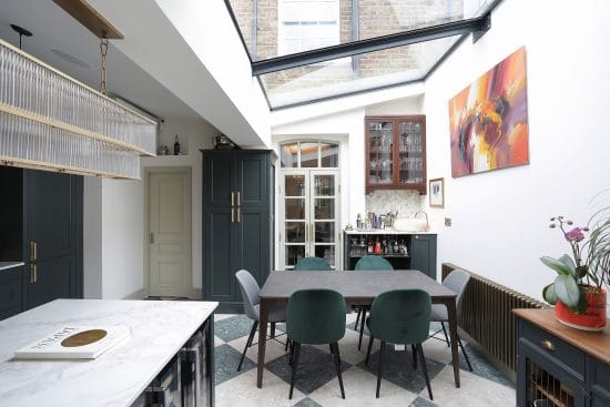 Butterfly roof kitchen extension with glazed section in London E1