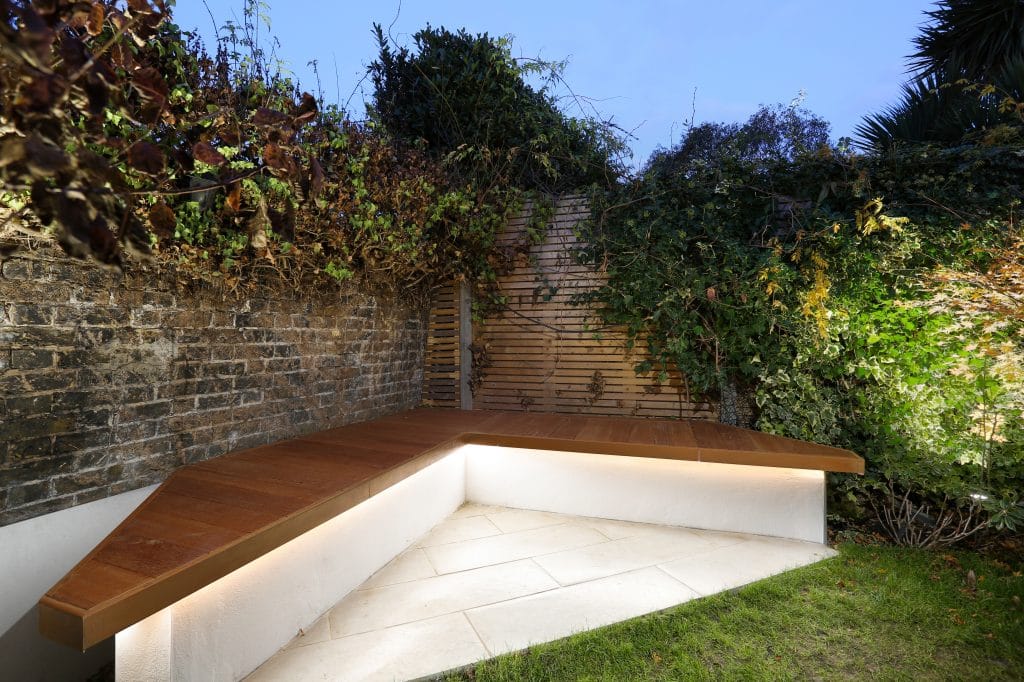 Outdoor patio seating area behind rear extension in Greenwich SE10