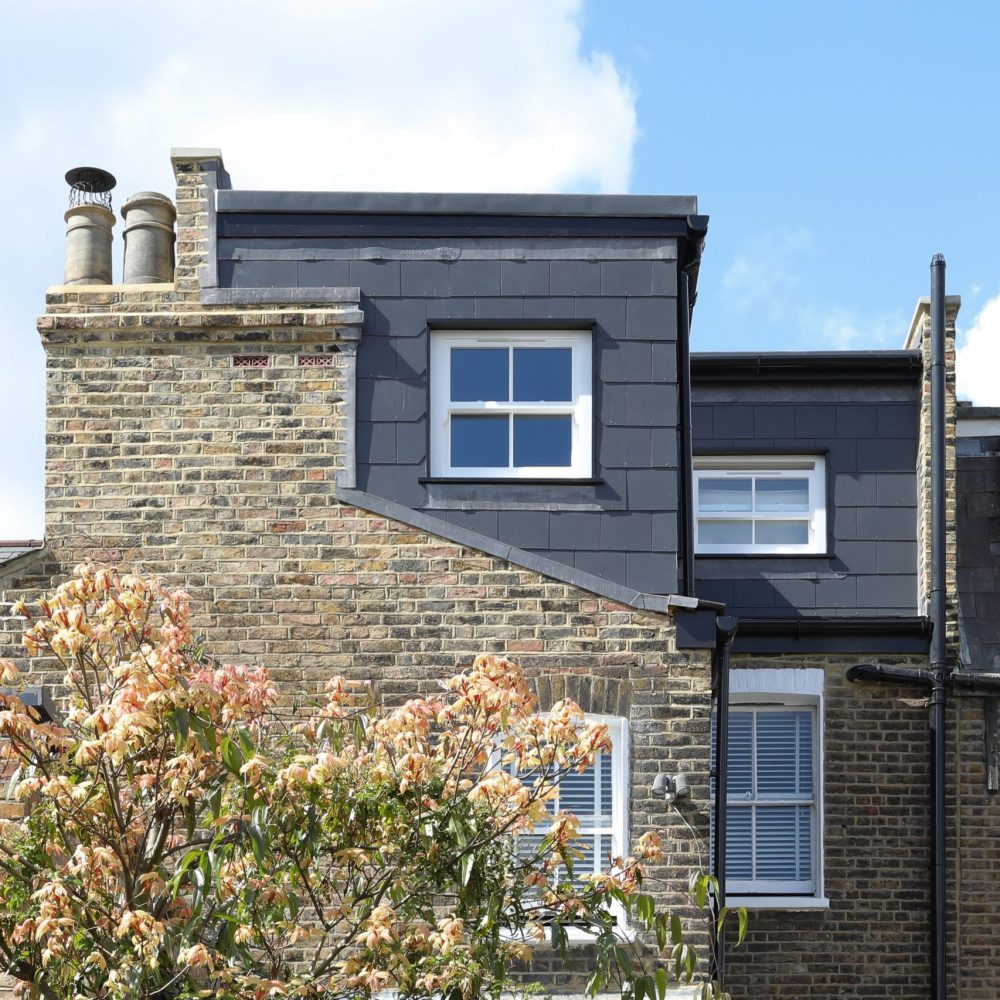 Completed L-shaped dormer loft conversion rear elevation in Greenwich SE10, London.
