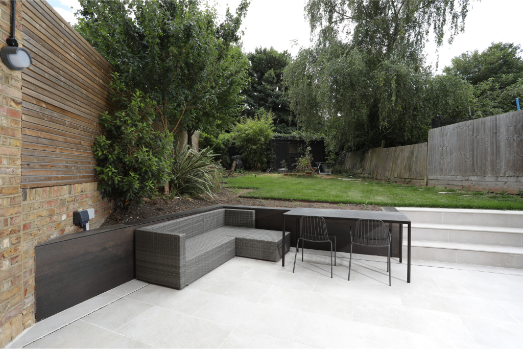 Tiled retaining wall and terrace construction in Greenwich garden renovation